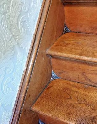 Antique stair dust corners