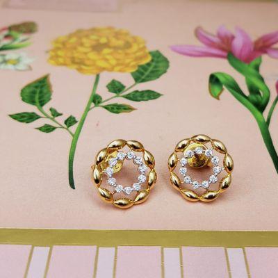 Twisted gold and Diamond circle studs in 18K Gold