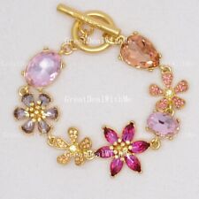 oscar de la renta multicolor crystals clover flower gold bracelet toggle bangle