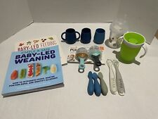 Lot of baby feeding items spoons cups Boon pulp feeder EZPZ cookbooks Munchkin